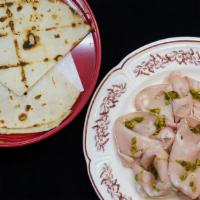 Mortadella Bolognese · Grilled Thin Piadina Bread, Pesto of Pistachio. Contains: Pork, Nuts, Allium, Gluten, Fin Fish