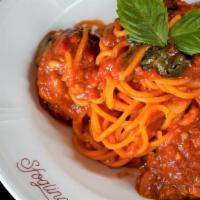 Spaghetti And Meatballs · You can't mess with the classics! Spaghetti with nonna palmina's meatballs.. Contains: Dairy...
