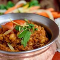 Chana Masala · Chickpeas Cooked w/ Tomatoes in a Special Masala