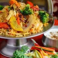 Vegan Mixed Vegetable Biryani · Basmati Rice w/ Mixed Vegetables, Herbs & Spices. Vegan.