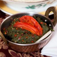 Vegan Saag · Fresh Spinach Delicately Cooked w/ Fresh Garlic, Onions, Herbs & Spices. Vegan.