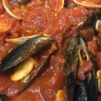 Mussels Marinara · Red or white sauce. served over spagetti.  Specify if you would like  it made spicy hot