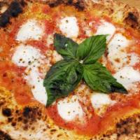 Margherita Pizza · Fresh mozzarella, San Marzano tomato, fresh basil, evoo.