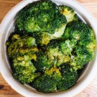 Parmesan Roasted Broccoli · Broccoli, olive oil, parmesan garlic, salt, and pepper. Served hot.