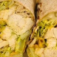 Chicken Salad Wrap · Oven Roasted Chicken, romaine, roasted corn, a squeeze of lime, and house-made avocado cilan...