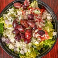 Greek Salad · Romaine, feta, kalamata olives, tomatoes, red onions and cucumbers.