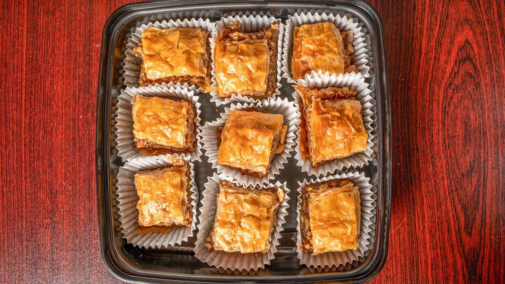 Baklava · Walnuts in layers of phyllo dough topped with honey syrup.