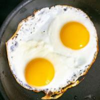 Two Eggs Any Style · 2 eggs any style with homefries and toast-
**go to sides to add bacon, sausage and canadian ...