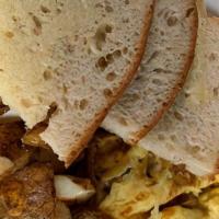 Three Stooges Omelette · Bacon, Ham , Sausage and cheddar cheese omelette with homefries and toast