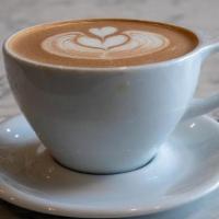 Mocha Latte - 12Oz · Intelligentsia's Black Cat Classic espresso with 10 ounces of steamed milk from Highlawn Far...