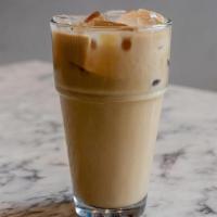 Iced Chai - 16Oz · A blend of traditional Indian spices and brisk black tea, Kilogram’s Organic Masala Chai is ...