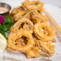 Fry Calamari · Deep fried squid served with spicy mayo shrimp and vegetable.
