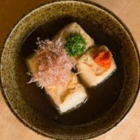 Agedashi - Tofu · Fried tofu served in a light fish broth with scallions and grated daikon radish. (Fried Tofu...