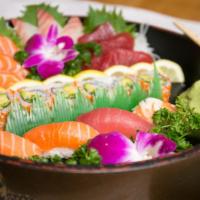 Party Boat (For 1) (19 Pieces) · Nine pieces chef selected sashimi, four pieces chef selected nigiri with California maki.