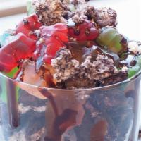 Dirt (Yo) · French vanilla and oreo yogurt topped with gummy bears, crushed oreos and chocolate syrup
