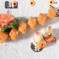 Godzilla Roll · Shrimp tempura inside, spicy tuna on the top with eel sauce.