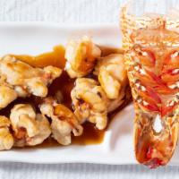 Lobster Salad Tempura · Shrimp tempura, cucumber inside, topped with lobster salad and tobiko soybean seaweed.