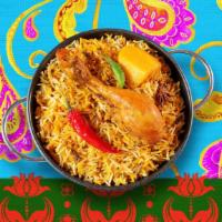 Chicken Biryani · Bonless chicken breast and basmati rice cooked with spices.