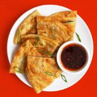 Scallion Pancakes · Savory chinese flatbread served with scallions and dipping sauce.
