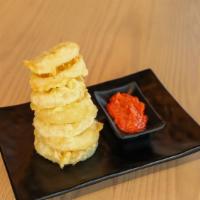 Onion Rings · Vegetarian. Lightly battered fried onions served with gochujang aioli.