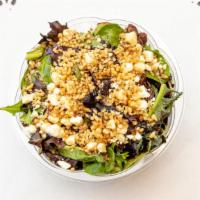 Bistro Salad · Mixed Greens, Raisins, Walnuts And feta Cheese with a balsamic Maple vinaigrette