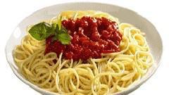 Spaghetti With Marinara Sauce · Dinner salad, garlic bread, fork, mozzarella cheese.