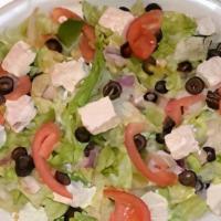 Greek Salad · Lettuce, roma tomatoes, green peppers, onions, black olives, feta cheese.