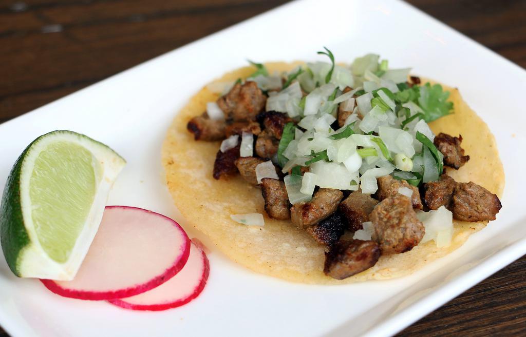 Barbacoa · Chipotle braised shredded beef, onions, and cilantro.