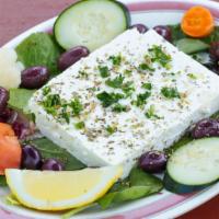 Feta · Served with kalamata olives topped with olive oil and a dash of oregano.  Served with pita b...