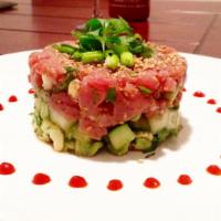 Tuna Tartar S · Raw. Fresh tuna mix with cucumber, mango and avocado tobiko and scallion on top with wasabi ...