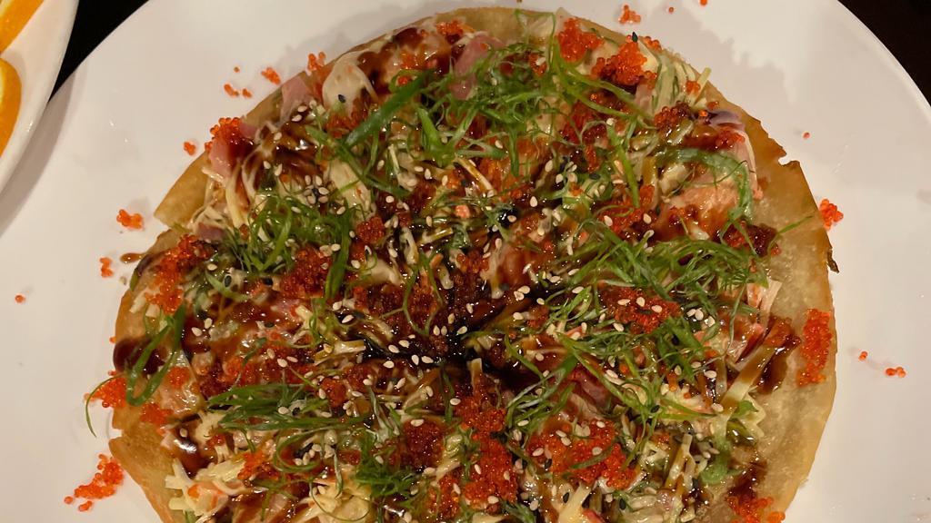 Sakura Pizza(6) · Served w. scallion pancake. Tuna, salmon, white fish, crab meat, seaweed salad, cucumber, fish egg, spicy mayo & eel sauce.