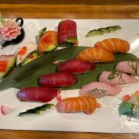 Tri-Color Sushi · 3pcs tuna, 3pcs salmon, 3pcs yellowtail & rainbow roll.