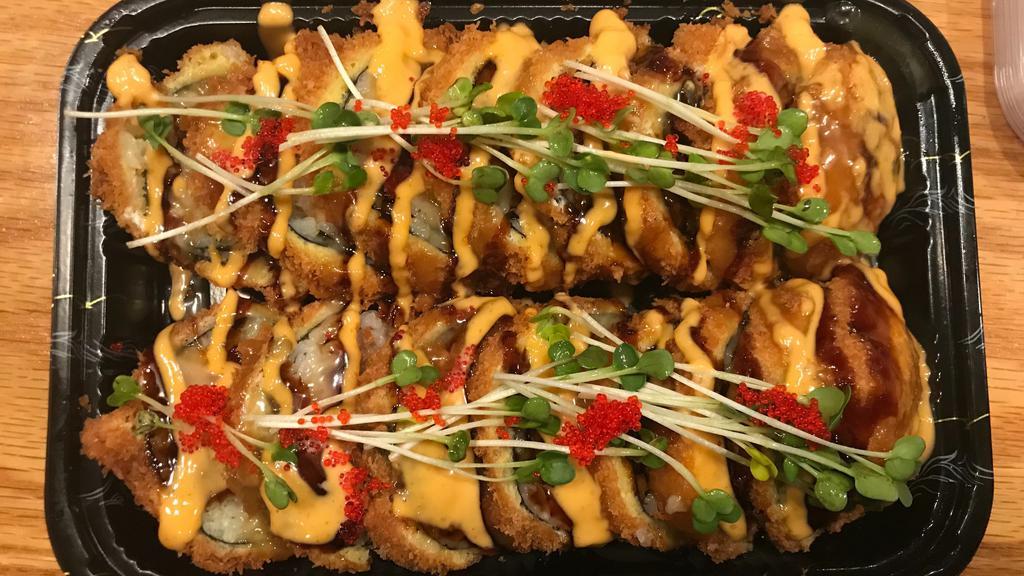 Crispy Salmon Roll · Lightly fried spicy salmon & cream cheese roll, topped with spicy mayo, honey wasabi sauce & eel sauce.