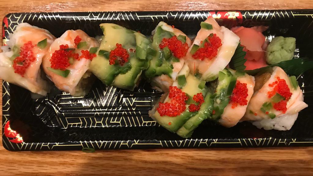 Spicy Bad Girl Roll · Spicy salmon, tuna, yellowtail inside, topped with shrimp, avocado jalapeño fish egg, with miso & honey wasabi sauce.