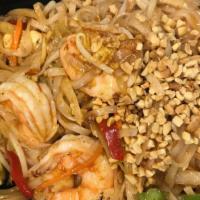 Shrimp Pad Thai · Rice stick noodle, onion, carrot, beansprout, green & red pepper, peanuts, fresh lines.