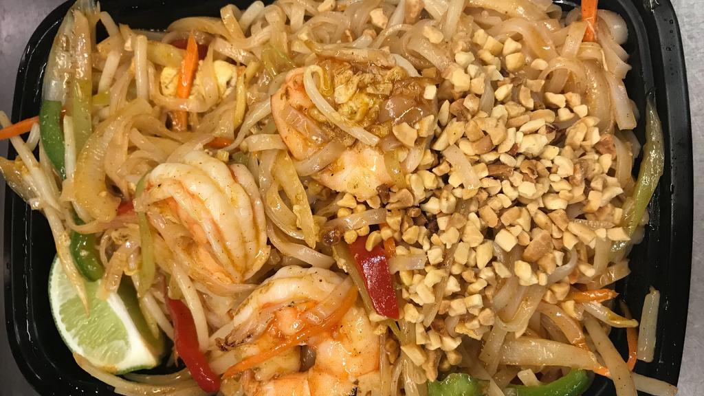 Shrimp Pad Thai · Rice stick noodle, onion, carrot, beansprout, green & red pepper, peanuts, fresh lines.