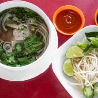 Phở Sate · Beef Noodle Soup with Sate   sauce , eye round steak, flank, Brisket, Tendon, and Tripe, tom...