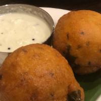 Mysore Bonda (5 Pcs) · Made with rice, lentils, fresh coconut, and spices. Served with chutneys on the side and ban...