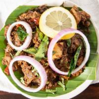 Mutton Chukka · Goat cooked with turmeric, ginger, garlic, curry leaves, red onions, crushed black pepper, a...