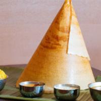 Plain Dosa · Made with fermented rice batter and beans. A thin rice crepe.