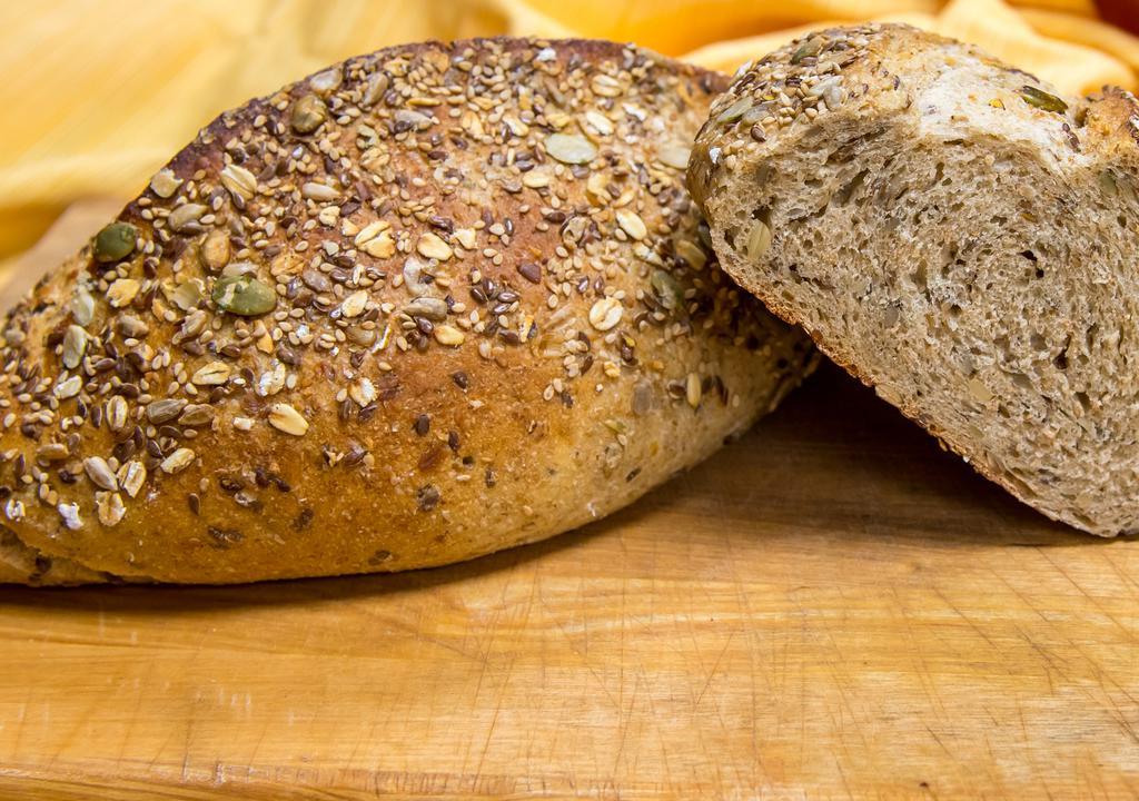 Harvest Grain Bread · This is a multigrain bread with seeds that has a chewy outside and soft inside.  Wonderful nutty flavor.
All breads sold are frozen and need to be reheated.  Instructions are included.