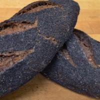 Baltic Black Bread · Covered in poppy seeds, this dark rye bread has sweet onions inside.  Sold Frozen, just rehe...