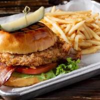 Fried Chicken Blt · Six ounces of chicken breast fried topped with herb aioli, bacon, lettuce and tomato, served...