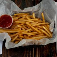 French Fries · Crispy golden fries with a side of ketchup.