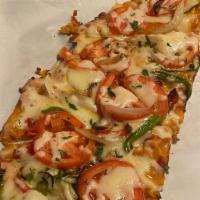 Veggie Flatbread · Personal pizza with marinara and melted mozzarella topped with grilled zucchini, yellow squa...