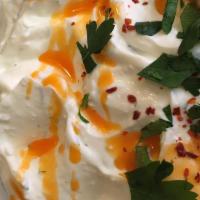Haydari · Kefir cheese topped with melted butter and garlic sauce.