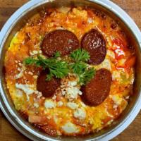 Menemen · Very popular Turkish style omelet with tomatoes, green peppers, and beyaz peynir. Available ...