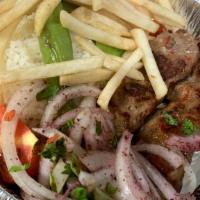 Adana Kebab · Ground meat mixed with onions, red bell pepper, garlic, and spices. Served with rice, fries,...