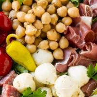 Individual Antipasto Salad · Imported ham, capicola, Genoa salami over a bed of mixed greens, red cabbage, crunchy cucumb...