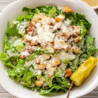 Classic Caesar Salad · Lettuce, topped with parmesan cheese, pepperoncini, croutons, and Caesar dressing.